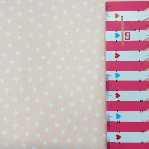 COTONE CUORICINI BIANCHI SPARSI SU BASE ROSA COTONE CUORICINI BIANCHI SPARSI SU BASE ROSA