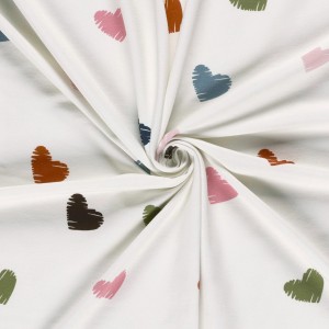 JERSEY GARZATO CUORI COLORATI BASE LATTE