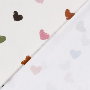 JERSEY GARZATO CUORI COLORATI BASE LATTE JERSEY GARZATO CUORI COLORATI BASE LATTE